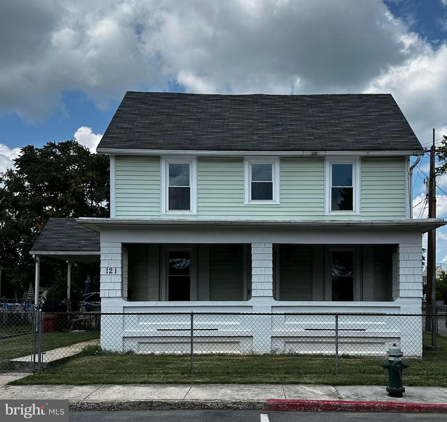 This charming income producing duplex is located on a fully fenced in corner lot and  is within walking distance to Hellane Park.  Front unit has 3 bedroom and 1.5 baths and the back unit has 2 bedrooms with 1 bath.

Live in one side and rent the other!  

This duplex can easily be converted back to a single family home!  

The front unit of the duplex has been tastefully updated, while the owner retained period woodwork for added charm.  It has 3 bedrooms, and 1 1/2 baths. Both bathrooms have been updated.  Brand new carpeting on the stairs and leading up to the  upstairs bedrooms.  There is fresh paint throughout.  The electric was upgraded for the front unit. This side also has a huge attic suitable to convert to a master bedroom, office or playroom!  Washer and dryer hookup. Refrigerator, range and dishwasher convey!

The back unit of the duplex is currently occupied by a long term tenant on a month to month basis. It has 2 bedrooms and 1 full bath with washer and dryer hookup. Refrigerator and range convey!  Please note the back unit has not been updated.  

Property is being sold in as-is condition.

Garage is an overside 2 car garage with storage shed and metal roof.  The garage is also being rented out by a long term tenant.