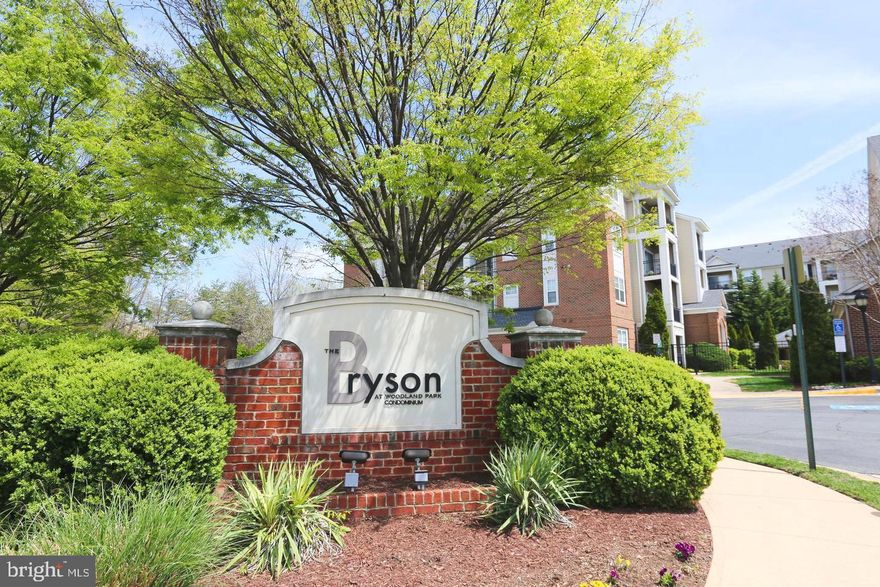 One of the Best locations in Herndon! Bryson at Woodland Park is a gated community close to EVERYTHING! Walk to shops and restaurants and the METRO! Minutes to Reston Town Center, Toll Road, Fairfax County Parkway and Rt. 28. Dulles International is less than 10 minutes away! The condo has a spacious bedroom and large bath with ceramic tile floor and walk in closet. The open floor plan is bright and airy and leads to a private balcony. Brand new carpet (2026). Fresh Paint (2026), Newer HVAC (2024).