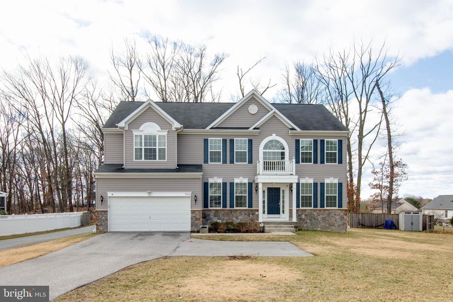 Welcome to 7054 Golden Crest, Elkridge — a modern retreat nestled on a premium private lot in a quiet cul-de-sac.

This meticulously maintained 5-bedroom, 3.5-bath home offers a bright, spacious layout with abundant natural light. The main level features a private office, formal dining room, and an open-concept kitchen with elegant cabinetry, granite countertops, and hardwood floors — seamlessly flowing into the living room, perfect for both everyday living and entertaining. A cozy library provides a peaceful space for quiet moments.

Upstairs, the primary suite boasts a custom-built walk-in closet and a luxurious ensuite bath with a double vanity, soaking tub, and separate shower. Three additional bedrooms and a full bath complete the upper level, offering plenty of room for family or guests.

The fully finished lower level provides a versatile space, including a guest bedroom, full bath, and expansive recreation area — ideal for hosting, a home gym, or media room.

Step outside to enjoy the maintenance-free deck and brick patio overlooking the private backyard, which backs to open space for serene outdoor gatherings. Additional features include a two-car garage, outdoor shed for extra storage, and ample storage throughout the home.

Conveniently located near major commuter routes, shopping, and dining, this home blends privacy and convenience — offering the perfect setting for modern living.

Don't miss this exceptional opportunity!