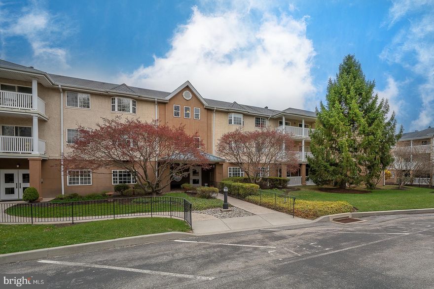 Light-filled and inviting, this top-floor home in Paoli Pointe offers easy living in a vibrant 55+ community. As you step inside, you'll find a roomy entryway with a coat closet and beautiful hardwood floors that flow seamlessly throughout the entire unit.
The floor plan is thoughtfully designed with an open layout that connects the living areas, creating a warm and welcoming space. A gas fireplace anchors the living room, while sliding glass doors lead out to a spacious, private balcony—perfect for a morning coffee or evening breeze. Crown molding adds a touch of sophistication, and the dining area, complete with chair rail detail, is generously sized for hosting guests or enjoying cozy meals at home.
The kitchen is well-designed and features ample cabinetry, a tiled backsplash, and a breakfast bar for casual dining or meal prep. Just off the kitchen, a large utility closet houses the washer and dryer and provides extra storage space for everyday essentials.
The two-bedroom layout offers privacy and flexibility, with each bedroom located on opposite sides of the unit. The expansive primary suite features enough space for a full bedroom set and reading nook, along with a deep windowsill that’s just right for a few favorite plants. A walk-in closet, tub, and linen closet complete the ensuite bath.
The second bedroom is equally spacious, with its own access to the balcony, a double closet, and a private bathroom with a stall shower—ideal for guests or a dedicated home office.
A lower-level storage unit is also included, providing plenty of space for seasonal décor, travel gear, or anything else you want tucked away but close at hand.
One of the best features of this unit? It’s in Building 100—home to all of Paoli Pointe’s main amenities. No need to brave the weather to enjoy the community lounge, library, conference and party rooms, billiards, gym, or full-service kitchen. Step outside into the courtyard or take a dip in the in-ground pool when the weather warms up.
Centrally located near shopping, dining, SEPTA’s Paoli Station, and King of Prussia, this is low-maintenance living in a location that keeps you close to everything.