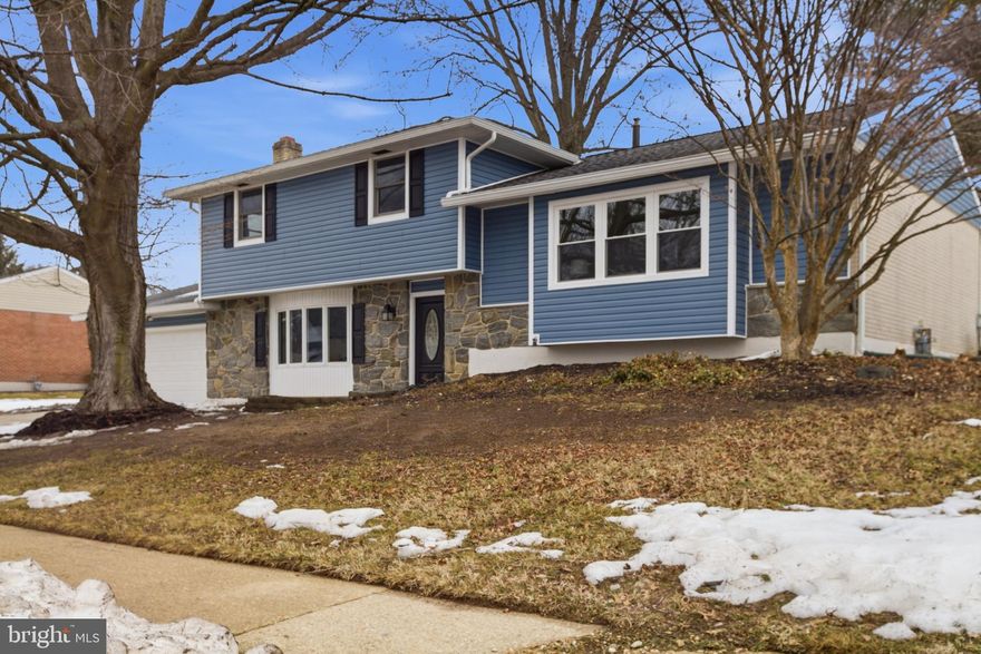 ***Highest and Best offers due by noon on Thursday, Feb 19th*** Welcome to 2421 Kingman Drive, a beautifully renovated split‑level home tucked inside the highly desirable Chalfonte neighborhood of North Wilmington. With 4 bedrooms, 2.5 updated bathrooms, and a long list of modern upgrades, this move‑in ready home is the perfect opportunity for buyers looking for style, comfort, and convenience. From the moment you arrive, the home’s fresh exterior makes a great first impression! Brand‑new vinyl siding, new windows and shutters, and a new garage door give the property crisp curb appeal. Step inside to find luxury vinyl plank flooring, a spacious foyer closet, and a bright, welcoming layout. The entry level features a generous living room with a cozy fireplace, new carpet, and updated lighting. This room is an ideal spot for relaxing or hosting friends. This level also includes a convenient bedroom, a fully renovated powder room with new tile, vanity, and lighting, plus an updated laundry area. Upstairs, the main living level offers even more space to spread out providing a comfortable retreat for movie nights or quiet evenings at home. A second large living room flows into the formal dining room, both featuring repolished hardwood floors and new light fixtures. The beautifully updated kitchen is a standout, complete with new stainless steel appliances, granite countertops, white cabinetry, new hardware, and recessed lighting. A cozy dining area sits just off the kitchen, perfect for everyday meals. The upper level includes the primary bedroom, which overlooks the private backyard and features a fully renovated en‑suite bathroom. Two additional spacious bedrooms and a second completely updated full bathroom complete this floor. Additional improvements include new exterior lighting, a refreshed shed, and a new roof (2019). Located near some of the Brandywine Valley’s most popular attractions including Longwood Gardens, Winterthur, Chadds Ford Winery, and summer tubing on the Brandywine River providing endless options for weekend fun. Enjoy shopping in nearby Glen Mills or take advantage of Delaware’s tax‑free retail just minutes away. With quick access to Route 1 and I‑95, commuting to the Philadelphia Airport or exploring the tri‑state area is a breeze. This beautifully updated move-in ready home offers the perfect blend of modern upgrades, space, and location. Schedule your showing today, this one won’t last!