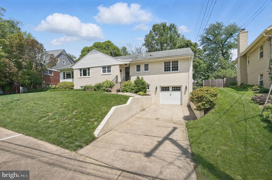 Fully updated by noted local builder M-R, light-filled rambler in sought-after Dover-Crystal in North Arlington. Well-maintained wood floors, open kitchen and stylish, updated bathrooms. Kitchen features stainless steel appliances, granite countertops and tile floors. Versatile den/study with vaulted ceilings and ceiling fan. Lovely living room accented by fireplace and large picture window. 3BR/2BA on main level. Primary bathroom boasts marble counters and floors. Absolutely massive, flat, fenced private backyard - very hard to find in this neighborhood. Lower level boasts a multitude of features and options: large bedroom and full bath, office/study, bright at grade recreation room, spacious laundry/storage area and mudroom off of extra deep garage. Room for a car plus bikes, sports equipment, etc.  Ample storage and closet space throughout. Unbeatable location, very little vehicle traffic as Dover-Crystal benefits from no thru streets. Near popular 67-acre Potomac Overlook Park, Marcey Park (tennis, pickleball, basketball) and Gulf Branch Nature Center (kids love it!). A breeze to DC -  just one stop light. Convenient to GW Parkway, Key Bridge, shops and restaurants on Langston Blvd. Within Donaldson Run swim club boundary. Schools: Taylor Elementary, Dorothy Hamm Middle, Yorktown High.