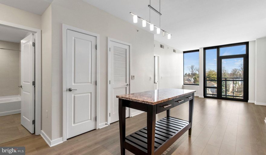 Nestled in the vibrant heart of Bethesda, Maryland, this luxury apartment complex offers an unparalleled living experience that combines modern convenience with sophisticated design. Designed to cater to the discerning tastes of urban dwellers, this property stands as a testament to luxury living, where every detail has been meticulously crafted to ensure the utmost in comfort and style.

*Exceptional Location*
Located in the sought-after Woodmont district, the apartment complex is perfectly positioned as a gateway to the best that Bethesda has to offer. Residents enjoy easy access to a plethora of amenities, including the Walter Reed National Military Medical Center, the NIH, and a variety of shopping, dining, and entertainment options. The prime location also offers convenient access to public transportation, making it easy to explore the wider metropolitan area.

*Architectural Elegance and Design*
The building's U-shaped design opens up to a beautifully landscaped courtyard, offering a seamless transition from the bustling city life to a tranquil oasis. The architecture is both richly textured and humanly scaled, creating an inviting streetscape that residents are proud to call home. A dramatic window wall façade and ground-level duplex units with front porches and planters further enhance the building's aesthetic appeal.

*Luxurious Amenities*
Residents of this apartment complex enjoy access to an array of exceptional amenities designed to enhance their lifestyle. The property boasts a large fitness center, fireside lounges, and a rooftop lounge equipped with bars, fireplaces, grilling areas, and two pools. Additionally, the convenience of having a 50,000 square foot grocery store within the building cannot be overstated. The property is also LEED Gold Certified, reflecting a commitment to environmental sustainability.

*Sophisticated Living Spaces*
The apartments themselves are a reflection of the luxury and sophistication that define the property. With a variety of floor plans, including studios, one to three-bedroom apartments, and townhomes, there is something to suit every preference. Each unit features designer finishes, stainless steel appliances, and spacious layouts that make coming home a pleasure.

*Community and Convenience*
The property is known for its friendly and helpful staff, ensuring that the needs of residents are met with professionalism and care. The well-maintained common areas and the sense of community fostered among residents make this complex more than just a place to live—it's a place to belong.

This luxury apartment complex in Bethesda, Maryland, offers an unmatched living experience for those seeking the best in urban living. With its prime location, architectural elegance, luxurious amenities, and sophisticated living spaces, it stands as a beacon of modern luxury and convenience. Realtors and renters looking for a property that combines the vibrancy of city life with the comfort of upscale living will find everything they desire and more at this premier apartment complex.

** Pricing and availability subject to change on a daily basis ** Photos are of model units ** Parking may be available for additional fee **