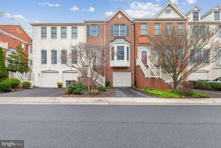 Come witness the completed transformation of this extraordinary 3-bedroom, 3 1/2 bath townhome  located in the sought after Rose Hill Falls Community.  The transformation began with flooring.  In 2021 the owners installed new flooring throughout the home with stunning hardwood floors throughout the first and second levels of the home.  The lower-level recreation room with a wet bar, received a makeover with gorgeous and durable LVP flooring and new paint.   On the main level, the transformation continued in the kitchen where the newly painted cabinets updated the space and made the stone fireplace in the adjoining family room shine!  Note the extraordinary amount of cabinet space and even a pantry!   The cozy fireplace makes this a real gathering space.  Upstairs, the owners fully renovated the primary bathroom which now features double sinks, a spacious shower, and an alluring slipper soaking tub!  The home still shows the meticulous craftsmanship of the builder, Winchester Homes.  As you enter the home you will be entranced by the dramatic two-story foyer which opens onto the light filled living and dining rooms.   The 9-foot ceilings throughout the home are heightened even further with vaulted ceilings in the upstairs bedrooms.  There is plenty of closet space with a walk-in closet in the Primary Bedroom.   Note the ceiling fans in all the bedrooms which add energy efficiency.  Entertaining is a breeze in this home.   There is a large deck, a spacious family room in the lower level with new LVP flooring, wet bar and updated bath, and nice rear yard. The Rose Hill Falls Community features tot lots, a walking path, tennis courts, and even basketball courts all for a low monthly fee!   All this and a convenient Rockville location close to commuting routes, METRO Red Line, shopping, and Rockville Town Center!