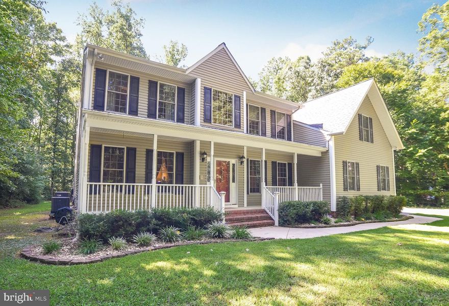 Beautiful Colony Builders built home in the established neighborhood of Porto Bello Estates.  Situated on on 1.47 acres this 4100 square foot home features 5 bedrooms and 3 bathrooms.    As you enter the private driveway you will notice the mature landscaping, ideal for rest and relaxation.  Park your vehicles in the spacious two car garage and enter the home.  flanking the foyer you will find a private formal living room ( potential use home office or virtual learning center) and the large formal dining room.  Continue into the two story family room with fireplace.  The oversized eat in kitchen with space for a table and also bar top seating.  The first level also features a bedroom with builtin book cases, a full bath, access to the private backyard (fenced in with built in playground)  with via the screen in porch, direct access to the garage, and a large pantry with built in shelving.   The second level can be accessed from 2 separate staircases (kitchen or the foyer). On the second level you will find 3 large bedrooms, a hall bath, oversized laundry room and an amazing master suite.  The master suite features multiple areas, space for a large bed, an seating area to relax with a double sided fireplace that peaks into the bathroom.  in the master bath the fireplace overlooks the gigantic soaking tub!   Relax in the soaking tub or revive yourself in the oversized master shower.  Enjoy the double vanity with tons of storage. Speaking of storage you will LOVE the storage in the master suite.  There are two separate closets and also unfinished space within the dormers for storage of all your seasonal clothing.