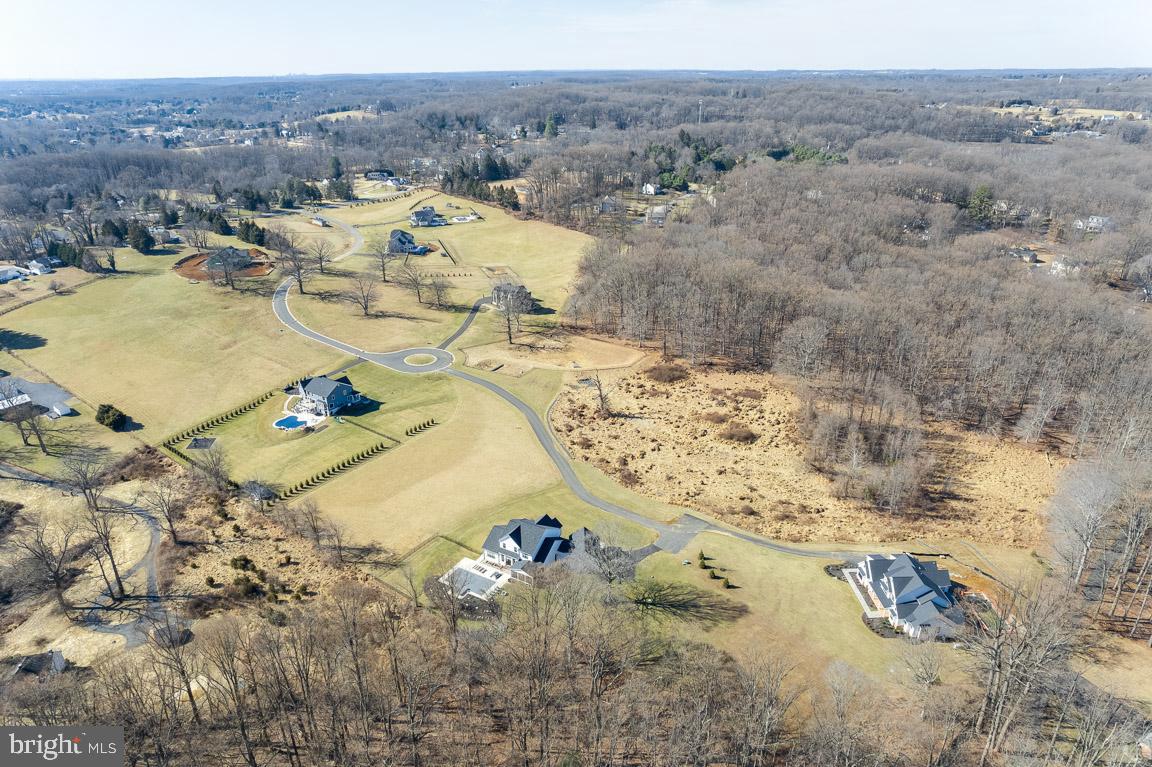 Exclusive HAHN's MEADOW has 7 remaining estate-sized homesites-all 1+ acres. The custom design lots are to be built by DANLEIGH HOMES. Advertised price is the lot price ONLY. This specific lot has a well with 12.5 gal/min yield and septic. Interior pictures are of previously build custom homes.