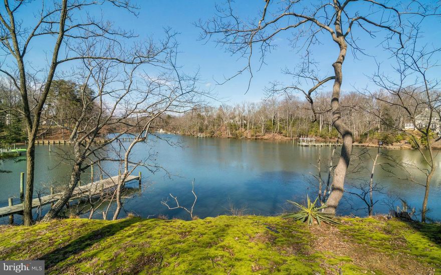 Fantastic Building site on Crab Creek/South River in area of fine homes. House sold "As-is" value in the land. Private 4.6 acres +/- (Tax records wrong), 380' of water frontage and beautiful view. Pier with deep protected water that can be extended. Close to town and easy access to all major commuting routes. Perc test completed, good to go.