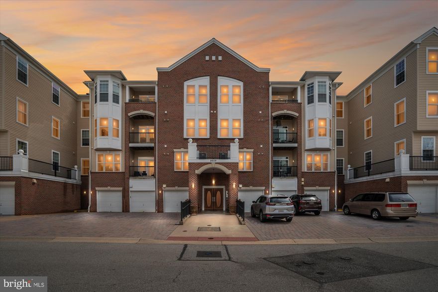 Spacious & Stylish 4th Floor Condo in Active Adult Community!

Welcome to this beautifully maintained, light-filled 3-bedroom, 2-bath condominium located on the 4th floor of a secure building in the sought-after Gatherings at Forest Glen, an active adult community within Piney Orchard.

This home features fresh neutral paint, gorgeous hardwood flooring throughout the main living areas, and brand-new carpet in all bedrooms. The spacious eat-in kitchen offers 42” cabinets, a large pantry, and ample room for storage and meal prep. Architectural columns elegantly frame the formal dining area and sunroom, creating a seamless blend of charm and function.

The bright sunroom offers flexible space for an office, guest room, or cozy sitting area. The primary suite includes a luxurious bath with a soaking tub, walk-in shower, and dual vanity, along with generous walk-in closets. Ceiling fans are found throughout the home, and a large laundry room adds convenience.

Enjoy the ease of an attached garage, located at the front of the building—first garage and driveway to the left of the main entrance.

As part of Piney Orchard, residents have access to a wealth of amenities, including shopping, restaurants, multiple pools, a community center with a fully equipped fitness room, lap pool, hot tub, and stylish meeting spaces. The nearby 300+ acre Nature Preserve is a true highlight, featuring scenic trails, wetlands, forests, and a heron rookery, all bordered by the WBA Trail and the Little Patuxent River.

Perfectly positioned near the MARC train station, Fort Meade, BWI Airport, and major routes to DC, Baltimore, Annapolis, and Columbia—this is a prime opportunity to enjoy comfort, community, and convenience in the heart of Odenton!