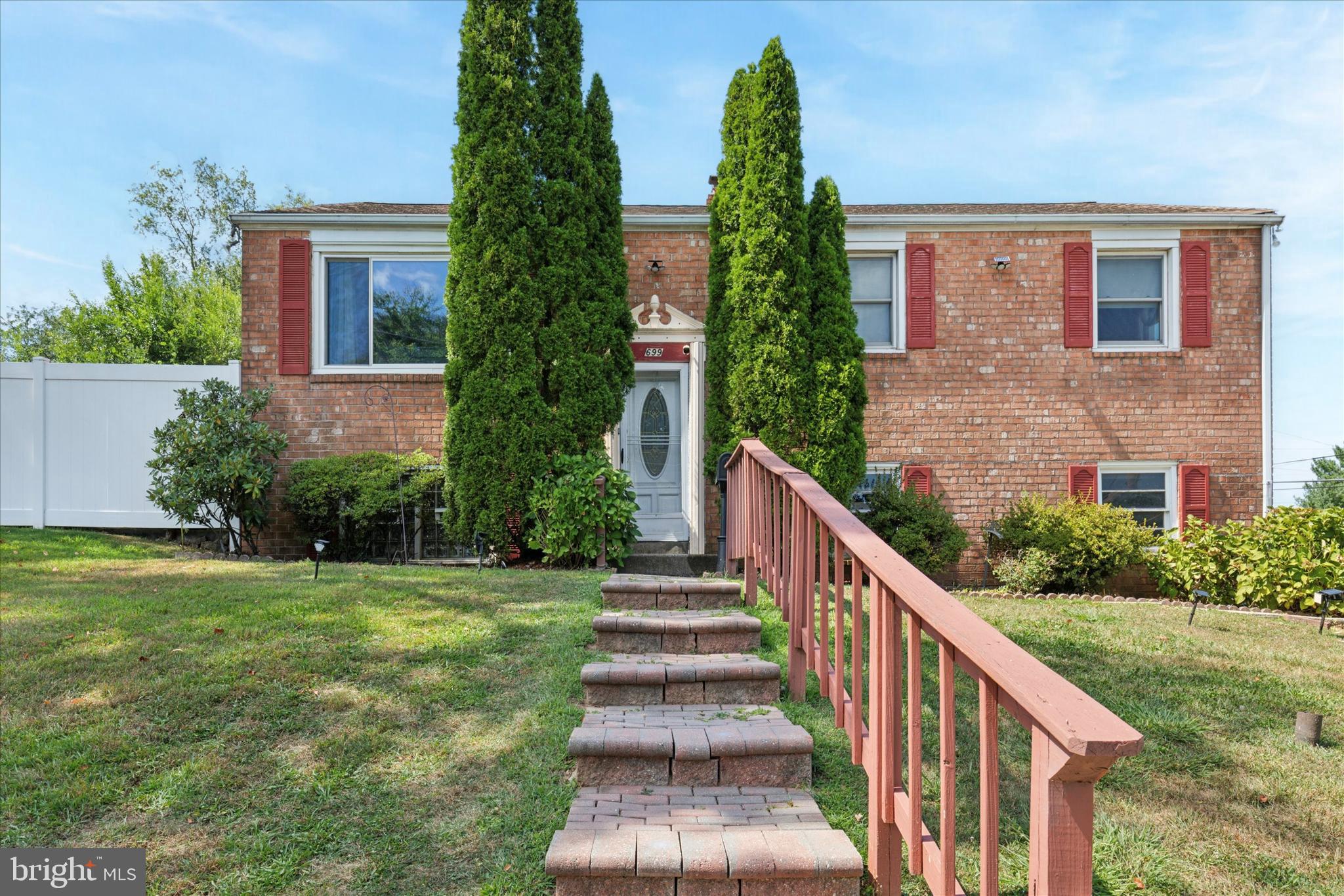 This brick bi-level home has a lot of potential! Located on a quiet street in the Sweet Briar community of King of Prussia yet just 5 minutes to the conveniences of Costco, the Regal 4DX Movie Theater, and the infamous King of Prussia Mall! As you enter the home into the foyer, you will notice that it has nice original hardwood flooring throughout most of the main floor and underneath the carpets in the bedrooms. The large living room has big windows that allow for plenty of natural light to flow in. The dining room has a nice chandelier and is a great spot for hosting family dinners. Thanksgiving is right around the corner! Just off the dining room is the kitchen with ample cabinet and countertop space. The rear door leads to a small deck that overlooks a large fenced-in yard with a small shed. Back inside and down the hall you will find 3 bedrooms, one of which is the primary bedroom with a half bathroom in it. There is also a hallway full bathroom with tub and a large linen closet. Make your way downstairs to the finished lower level where you have a large family room and a potential 4th bedroom . There is a full bathroom nearby and a separate finished area that has laundry and is great for storage. There is also another door that leads to the side of the home and a door that leads to the attached 1 car garage and driveway. The home also has newer HVAC and 150 amp electrical service. It does need updating through-out, but is full of potential and is located in the award-winning Upper Merion School District and just minutes from the Schuylkill River Trail, Valley Forge National Park, and the impressive King of Prussia Town Center. You can also walk to the local elementary school!