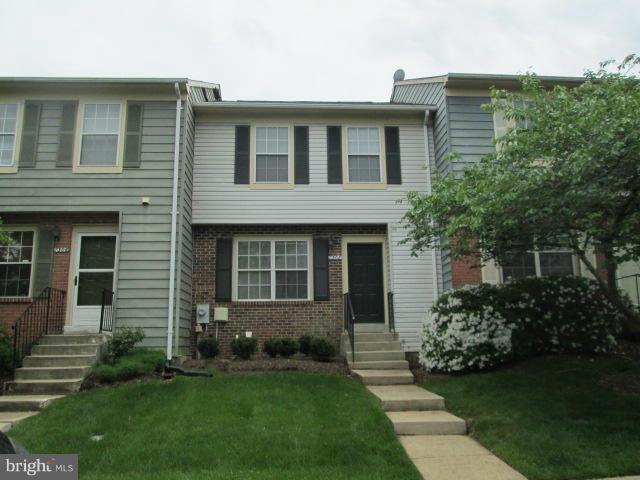 Move-in ready! New appliances, counters in sunny eat-in kitchen! Main level Beautiful hardwood in Living and Dining Room, with step-down living area. 3 Bedrooms up and a fully finished walk-out basement with a full bath and large laundry area. Walk-out to patio! Popular community with tot lot and tons of trees. Terrific location for commuters close to shopping, schools and services!