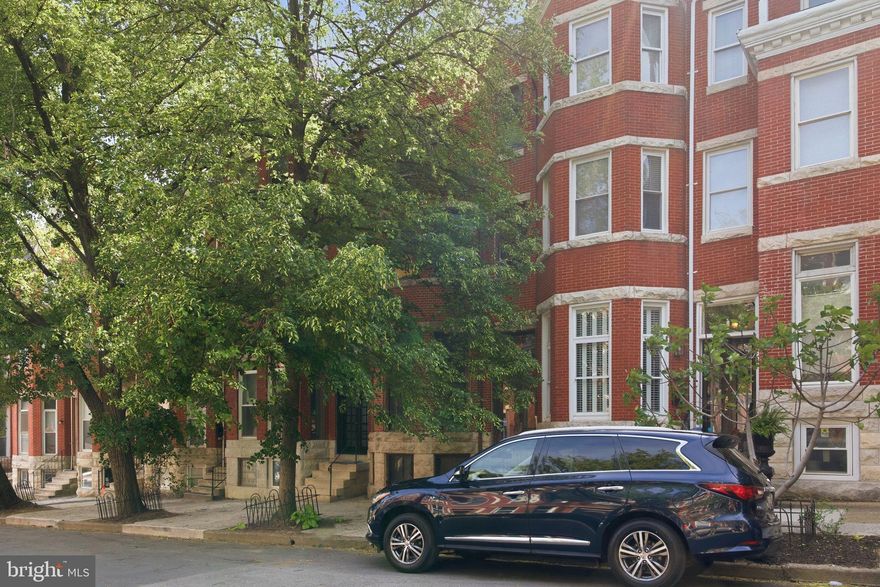 Just steps from the new Reservoir Square development, this three-story brick building offers a versatile renovation opportunity in one of Baltimore’s fastest-growing neighborhoods. Currently arranged as three separate apartments, the property can be updated in its existing configuration or converted back into a spacious single-family home. The building features approximately 2,916 square feet of above-grade living space, plus an unfinished basement. Each level is designed as a two-bedroom, one-bath unit, complete with existing kitchen hookups (gas and plumbing), living areas, and generously sized rooms. Original architectural elements—including a beautiful central staircase and pocket doors—remain intact, adding character and charm. Gas and electric services are already separated for three units, along with a public service meter. The property includes four 100-amp electric meters, two active gas meters, and two additional gas hookups. Heating is supplied by a gas-fired boiler, with hot water provided by a gas-fired water heater. Gigantic large rear yard presents an opportunity to add off-street parking for multiple vehicles. Just minutes from Druid Hill Park, the Baltimore Zoo, Inner Harbor, Johns Hopkins, Camden Yards, MT Bank, and nearby parks and trails. Schedule a private tour today!