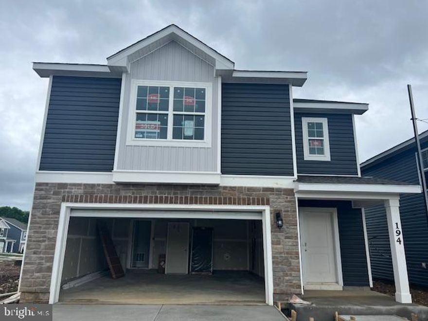 This brand new Elm model, a contemporary 2,415 square feet two-story home, features five bedrooms, three bathrooms, a loft and a two-car garage. As you step into the distinct foyer you will appreciate the open concept floor plan. The spacious kitchen boasts an abundance of cabinetry and counter space, an ample walk-in pantry, a large island with room for seating and stainless-steel appliances. The kitchen has an eat-in dining space that flows perfectly into the sizable living room. A secondary bedroom is conveniently located on the first floor tucked in the back of the home for privacy. A full bath and linen closet are located off the kitchen and bedroom. Near the two-car garage is a coat closet. Upstairs, the huge loft area and additional four bedrooms provide enough space for everyone to rest and relax. The owner’s suite boasts an ample bedroom, two generous walk-in closets and an over sized owner’s bathroom with double bowl vanity. The second floor also features the laundry room, a roomy secondary bathroom with double vanity and a large hall linen closet. Home Is Connected® Smart Home technology. West Wind is a beautiful new community close to Winchester, VA, offering new single-family homes in the scenic Shenandoah Valley.