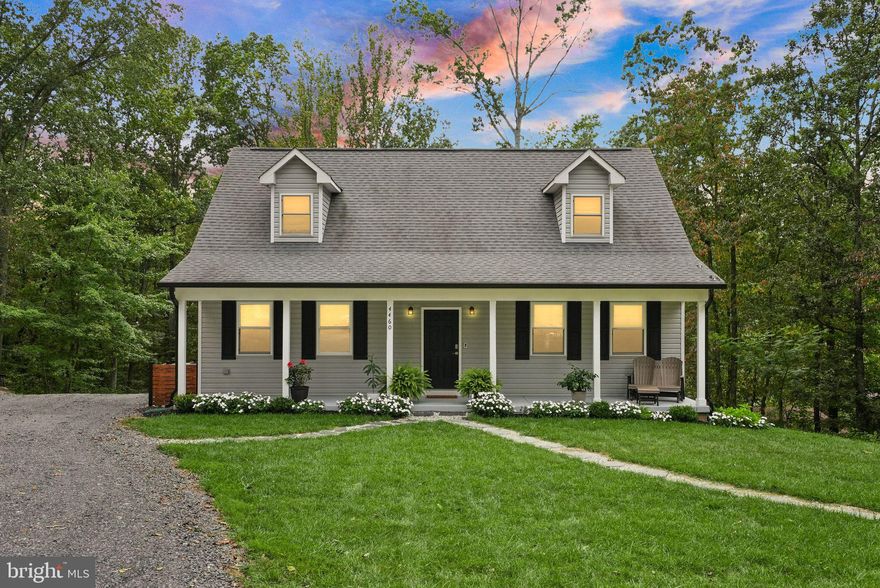 HONEY… STOP. THE. CAR.
THE COUNTRY RETREAT EVERYONE WANTS — WITH ALL THE BELLS & WHISTLES...
Just one mile from I-66, this 2019 custom Cape Cod  (4 bedrooms/4 bathrooms) sits on a private, wooded acre—the kind of home that makes you grab your partner’s arm and say: “This is the one.” From the moment you arrive, the charm is undeniable: a classic front porch, beautiful landscaping, and the peaceful ambiance of country living, all while being minutes from Haymarket, Warrenton, wineries, dining, and the best of Northern Virginia.
Inside, warm distressed hardwood floors flow throughout the main and upper levels. The living room features designer shiplap walls, creating a cozy, modern farmhouse feel perfect for relaxing or entertaining. The kitchen is a total showstopper with custom cabinetry, butcher block accents, upgraded quartz countertops, an extended peninsula with seating for four, subway tile backsplash, and premium stainless steel appliances. A main-level bedroom with full bath provides flexible space for guests or multigenerational living***Upstairs, the primary suite is a peaceful retreat with dual custom walk-in closets and a spa-inspired bath with upgraded tile and a glass-enclosed shower. Two generously sized secondary bedrooms share a beautifully renovated Jack-and-Jill bath, giving everyone their own space in comfort and style.
The fully finished walk-out basement adds incredible versatility with a large recreation room, a bonus room for a gym, office, or studio, a full bath, laundry area, and ample storage. Whether it’s a playroom, home theater, or workspace, this level has it all***Step outside to your private backyard retreat with a maintenance-free TREX deck, fully custom wood fence, large storage shed, concrete pad for organization, and newly installed French patio doors bringing in tons of natural light. The yard is perfect for entertaining, relaxing, or simply enjoying the peace and privacy of this wooded setting***All of this comes just 45 miles from Washington, D.C., with quick access to I-66, Routes 29, 28, 50, 15, and 17, nearby wineries, restaurants, cafés, shopping, and Dulles International Airport***Tranquility, convenience, and style all in one remarkable home.