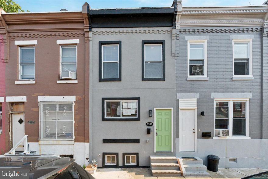 Fully renovated and move-in ready, this gem offers the perfect blend of comfort, style, and value in one of North Philadelphia's rapidly growing neighborhoods. Step inside to an open-concept living and dining area with recessed lighting, modern flooring, and great natural light. The sleek kitchen features quartz countertops, white shaker cabinets, stainless steel appliances, and a clean, timeless backsplash. Upstairs, you'll find two well-sized bedrooms and a beautifully upgraded full bath with contemporary tilework. The basement provides extra storage space and is clean and dry — ideal for future finishing or use as-is. Outside, enjoy a private fenced-in patio, perfect for entertaining or relaxing. This turnkey home is a great fit for first-time buyers or investors alike — conveniently located near public transit, local parks, and Temple University Hospital. Start building equity from day one!