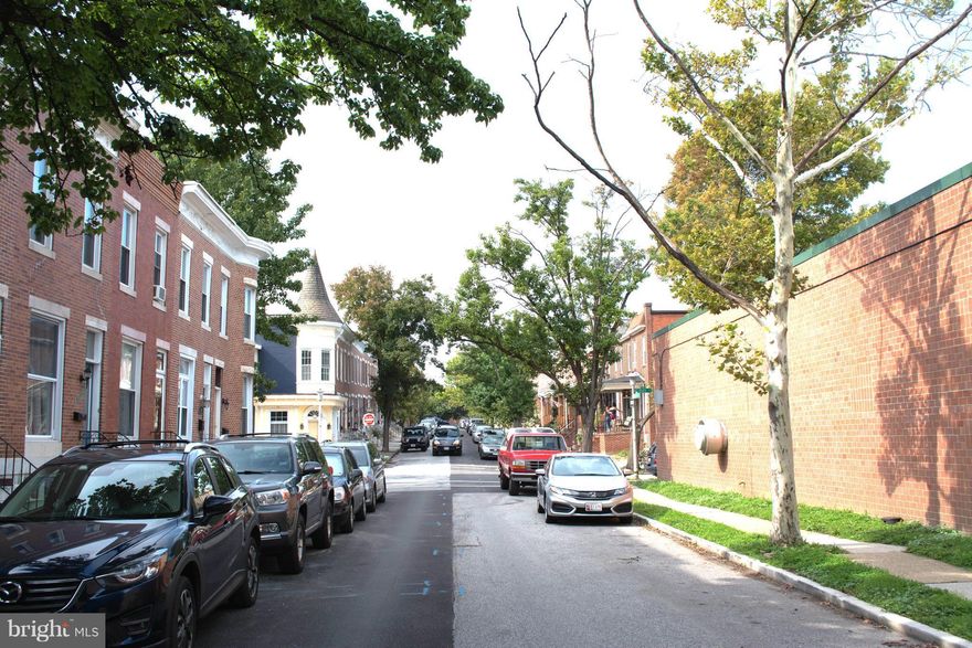 One of the finest Historic District townhomes in Federal Hill w/ Parking Pad. Completely Remodeled & Updated with incredible attention to detail. 3 Bedroom/3 Full Bath. Hardwood floors throughout main level & second level master. New carpet in 2nd & 3rd Bedrooms. Light-filled master suit with elegantly designed bath. Gourmet Kitchen features new SS appliances & Granite Counter-tops.
