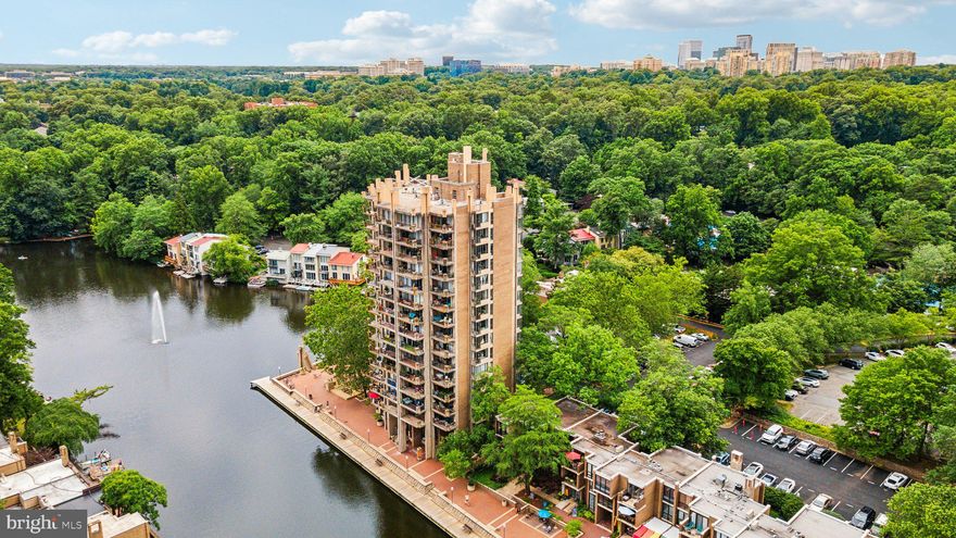 Welcome to this stunning 2-bedroom condominium located in the heart of Reston, offering breathtaking views of Lake Anne. Spanning 1,070 square feet, this beautifully updated unit blends modern convenience with timeless elegance.

As you enter, you'll be greeted by the warmth of hardwood parquet floors that flow throughout the open and inviting living spaces. The newly renovated kitchen boasts state-of-the-art appliances, sleek countertops, a stylish backsplash, and ample cabinetry, making it a chef's delight.

The living and dining areas are bathed in natural light, thanks to large windows and a sliding glass door that leads to your private balcony—perfect for enjoying morning coffee or evening sunsets with a view of Lake Anne.

The primary bedroom is a true retreat, featuring custom closet shelves and organizers for all your storage needs. The en-suite primary bathroom is a showcase of luxury with its new brass finishes and contemporary design. A second bedroom and an additional full bathroom provide ample space and comfort for family, guests, or a home office.

Reston residents enjoy a range of top-notch amenities, including pools, recreation facilities, and tennis court access just minutes away. The association fee covers all utilities, including cable, air conditioning, heating, electricity, gas, water, laundry, extra storage, and trash removal, ensuring a hassle-free living experience.

Located in a vibrant Reston neighborhood, this home is just moments away from shops, restaurants, and cultural attractions. Enjoy the convenience of nearby parks, walking trails, and public transportation, making it easy to explore everything the area has to offer.

Don't miss this opportunity to own a piece of paradise in Reston and experience the best of Reston living!