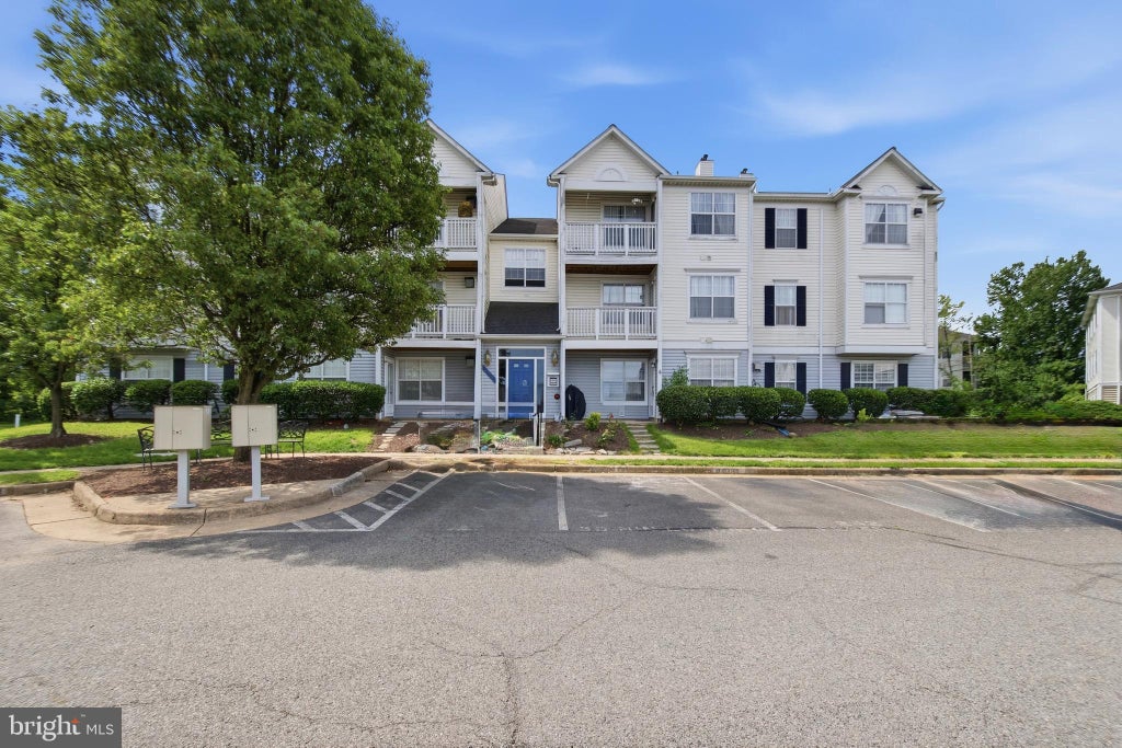 Photo of 8058 Lisle Drive #104, MANASSAS, VA 20109 (MLS # VAPW2120374)