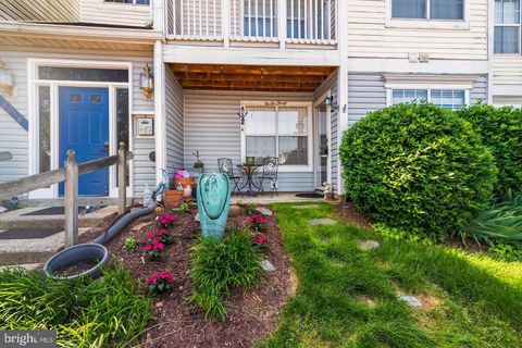 Photo of 8058 Lisle Drive #104, MANASSAS, VA 20109 (MLS # VAPW2120374)
