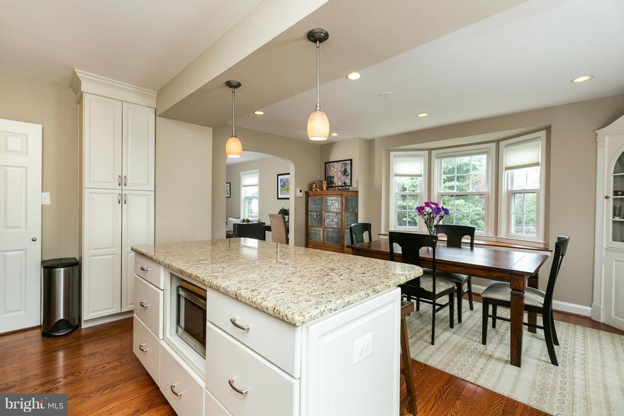 OPEN 5/8/16 11 am to 1 pm!  End of Group with an Unbelievable Kitchen Renovation! Truly a Beautiful Home. Refin. Hardwood Flrs, Lots of Natural Light with Side Windows and Bay Window in Dining Area. Chef's Kitchen with Granite Island, Stainless Appliances, Upgraded Cabinets. New Glass Door Leads to Deck and Large Fully Fenced Yard. Three Good Size Bedrooms and Finished L/L with Plenty of Storage.