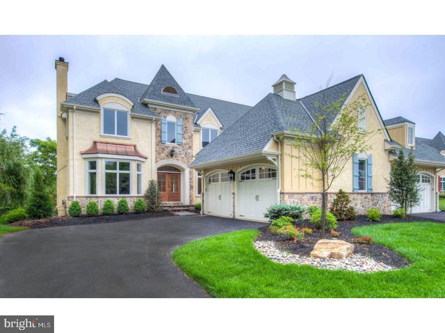 **FALL INCENTIVE 3% OFF SALES PRICE** Welcome to 130 Green Lane, a fully finished Pembrey model is located on a premium corner lot in desirable Haverford Reserve, and is available immediately. This carriage home simply stunning offering every possible amenity and upgrade desired by today's buyer. This lovely property provides 3,810 square feet of an open and airy floor plan. Enter into the center hall and you are immediately struck by the 4" finished light oak hardwood floors, and wonderful woodworking throughout. On your left is the sun-filled formal living room with a gas fireplace and a beautiful bay window. Enjoy cooking and entertaining in a gourmet chef's kitchen including a large navy-blue island with a farm sink, beautiful quartz counter tops, and Wolf appliances. You'll notice the beautiful oak wood open shelving that matches the truss beams for the cathedral ceiling in the Great Room. Open to the kitchen with a second gas fireplace, the Great Room is the optimal place for entertaining. For breakfast, eat in the morning room just off the kitchen or step out onto the deck with ultimate privacy. The first floor is completed with a study, butler's pantry including a wine fridge, solarium and a formal powder room. Upstairs the private master suite includes a walk-in closet, dressing room and a spa-style master bathroom with his/her vanities, an oversized soaking tub and frameless glass shower. Two more spacious bedrooms both have en suites and the laundry room is convenient upstairs with a sink and storage. Electrical and plumbing upgrades throughout along with surround sound and security system. Options to customize with an elevator or finish the lower level, all by Guidi Homes.