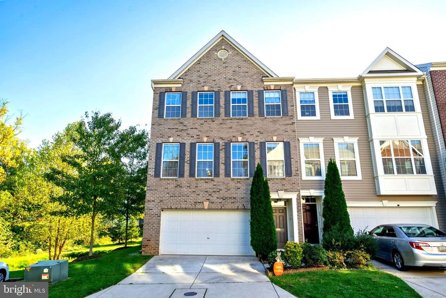 Stunning end-of-group townhome in the highly sought-after Simpson Mill community, ideally positioned on a premium cul-de-sac lot with serene woodland views, ensuring a wealth of privacy. This home has been freshly updated with new carpet and paint. The open floor plan is truly remarkable, featuring bump outs on all three levels, showcasing gleaming hardwood floors throughout.

The main level includes a living room and sunroom that opens to an expansive, low-maintenance composite deck, perfect for hosting gatherings with family and friends. The chef's eat-in kitchen is a showstopper, boasting sleek stainless steel appliances, granite countertops, a decorative backsplash, a 10-foot island, breakfast bar, and pendant lighting. A bright breakfast room and a powder room complete this level.

Upstairs, the primary bedroom is a luxurious retreat, complete with a sitting room, a walk-in closet, and a spa-like en-suite bathroom with dual vanities, a soaking tub, and a glass-enclosed shower. Two additional bedrooms, a laundry room, and another full bathroom round out the upper level sleeping quarters.

The lower level features an expansive family room with garage access and comes with amenities such as a whole-home humidifier, car charging outlet, and a Nest thermostat.

Outside, the property sits on a cul-de-sac, premium lot with beautifully landscaped grounds, sidewalks, streetlights, and a backdrop of trees. The community offers a tot-lot and walking paths for outdoor enjoyment. Nearby, you'll find a wealth of recreational options at Robins Nature & Visitor Center, Middle Patuxent Environmental Area, and Hobbits Glen Golf Club.

Conveniently located with easy access to Ellicott City and Columbia, you'll have a wide array of shopping, dining, and entertainment choices. Commuting is a breeze with nearby access to MD-32, MD-108, US-29, and I-95.