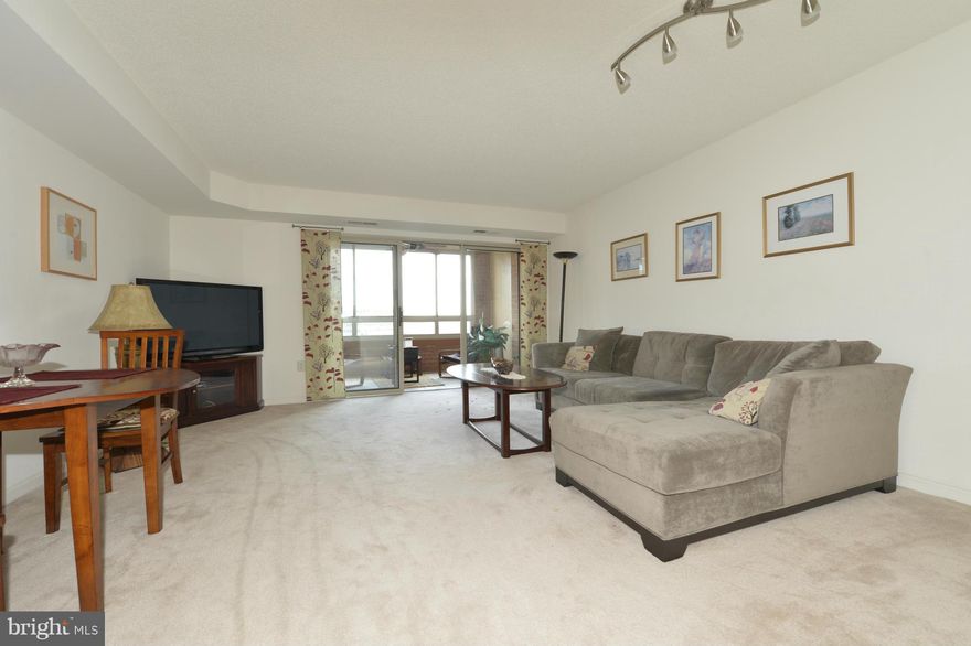 Convenience, Comfort, & Charm! Great 1 Bedroom home in the "South" building of Carlyle w/24hr staffed front desk. Enjoy a marble foyer, enclosed balcony (not incl in 761 sqft), sumptuous master bathroom w/soaking tub and dual vanity. Features great 15th floor views. Amenities include 2 gyms, pool, tennis, putting green, dog park, parking & storage. Walk to Metro, Whole Foods, movies & restaurants.