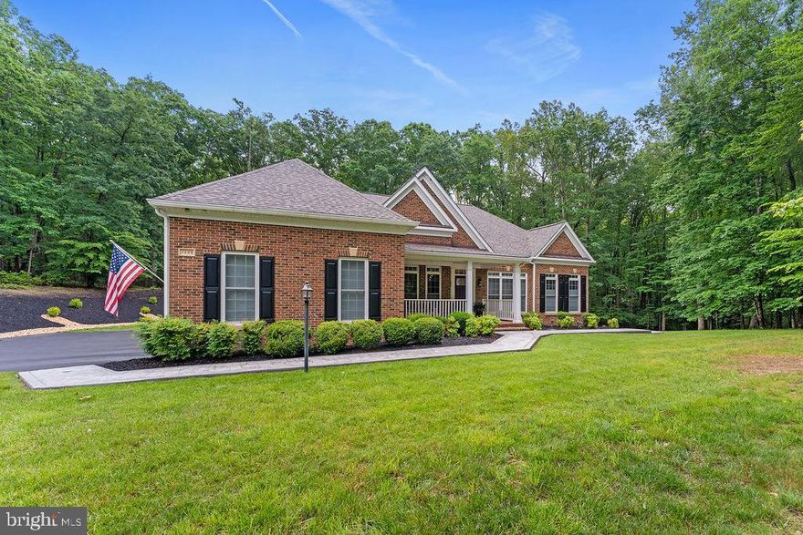 Wonderful custom Winchester built St. Andrews model home with over $150K of updates and improvements including new roof, gutters, deck, shed, patio, remodeled kitchen, whole house generator and more.  Lower level has the 4th BR and a 5th BR (NTC) plus a hobby room that could be a 6th BR.  Meticulously maintained in the private community of Glen Haven, this 3 acre property offers main floor living with plenty of space on the finished lower level and is perfectly nestled on a wooded lot.  Even the 3-car side load garage has been updated with paint and coated flooring.   The main floor family room features a wood-burning fireplace with stone surround, vaulted ceiling, recessed lighting and is perfectly located next to the gourmet kitchen.   Tasteful custom touches are evident throughout the home including built-in bookcases in the main level home office.
Also,  washer dryer hook up in basement, speaker system in the main area garage, electronic control room and security system throughout the entire house.  Why wait to build when you can move into this main-level living beauty quickly!