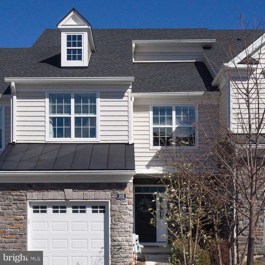 Welcome to this beautifully maintained 3-bedroom, 2.5 bathroom carriage home, offering a prefect blend of elegance and convenience.  Nestled in a desirable community, this home features an open concept layout and abundant natural light, stylish finishes and modern amenities.  The spacious kitchen boosts quartzite, double thick on island ,cast iron farmhouse sink and Jennair appliances.  The upgraded  kitchen cabinets layout is a custom design with plenty of storage.  The floor includes beautiful hardwoods, a dining area and powder room.  Upstairs, the primary suite provides a peaceful retreat with two walk-in closets and en-suite bathroom with upgraded tile.  Two additional bedrooms share a well-appointed full bathroom.  Another standout feature is the added third floor loft-perfect as a home office, media room, or guest space.  Enjoy outdoor relaxation on the private deck, and take advantage of the attached garage with extra storage. Located in vibrant community with sidewalks and scenic views, this home offers a perfect setting to leisurely walks while being just minutes from shopping, dining, the train and major commuter routes. Schedule your tour today!