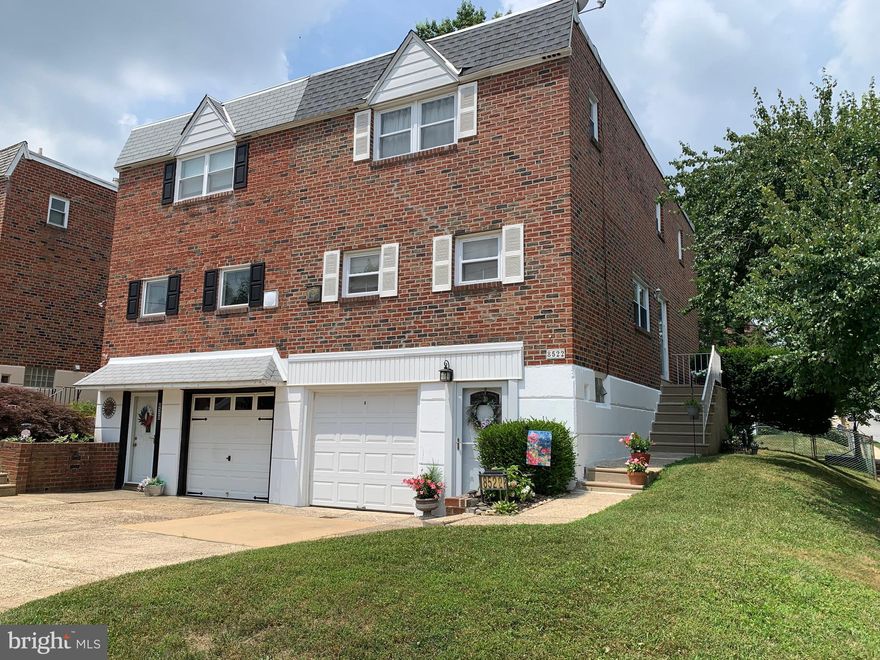 Welcome home to this lovely 3 bedroom, 2.5 bath twin townhome located on a large corner lot in the peaceful Fox Chase neighborhood of Far Northeast Philadelphia.  Enter the 1st floor through the side main entry door to the foyer area with a separate coat closet and gorgeous parquet wood flooring. To the front of the 1st floor you will find the formal dining room with hard wood flooring which leads to the spacious eat-in-kitchen that has plenty of counter and cabinet space.  Off the rear of the dining room you will find the stairway to the basement and the half bathroom located at the top of the stairs.  At the rear of the 1st floor is the comfortable living room, also with hardwood flooring and the staircase to the 2nd floor.  At the top of the 2nd floor stairs there is a nice size linen closet and the full size hall bathroom with a sky light vent.  At the front of the 2nd floor is the primary bedroom large enough to accommodate a king sized bed.  Attached is also an on-suite bathroom with shower and a walk-in closet.  At the middle of the 2nd floor is the roomy 2nd bedroom with ample closet space.  At the rear of the 2nd floor is the 3rd large bedroom, also with plenty of closet space.  Head back down both stairways to the full size finished basement, where you will discover the laundry/utility area off the front hall which leads to the front exterior door that provides quick access to the driveway and one car garage.  At the rear of the basement there is sliding glass doors with direct access to the private patio and fenced in yard.  This beautifully kept property is ideally located near the Blue Ribbon Greenberg Joseph School and is within walking distance to the Regional Rail line, Champion Park playground and street access points to the miles of walking/biking trails throughout nearby Pennypack and Lorimar Parks.  This neighborhood has a suburban feeling without the suburban taxes and is still just a short drive to all major highways and bridges in the Greater Philadelphia metropolitan area.  Schedule your showing today!