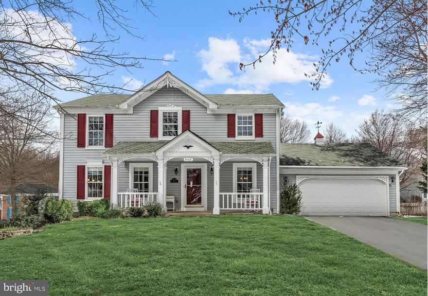 Colonial home on corner lot & tree lined street! Crown molding, Brazilian cherry hardwood floors, wainscoting, stainless steel appliances, granite countertops, & more! 2 Story Foyer. French doors to main level study w/ built ins. Formal dinning room sure to impress. Family room off kitchen & sliding door to large deck overlooking spacious & fenced yard. Fully finished basement! Outparcel (no HOA)