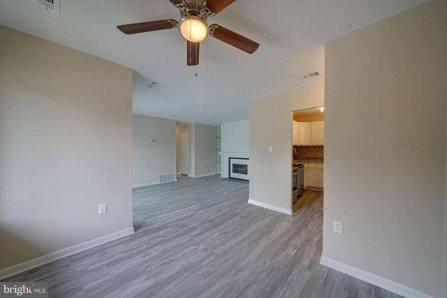 Top floor condo!!! Convenient location providing access to numerous amenities with this 2 bedroom 1.5 bath condo in the heart of Columbia. Brand new kitchen, updated HVAC and thermostat (Nov 2021), brand new bathroom vanities, shower, toilets & fixtures, door handles, and Everlife LVP flooring. New trim and fresh paint throughout including ceilings, trim and doors. All flooring replaced throughout each room and in closets with Everlife wood-look waterproof luxury vinyl plank floors. Approximately 976 total square feet featuring formal living room, separate dining room and sunroom. Kitchen cabinets and granite countertops are all newly installed with new GE Stainless Steel appliances including gas stove, built-in microwave, and dishwasher plus new side by side refrigerator. Custom tile backsplash in kitchen. Large living room space features wood burning fireplace, mantel and built-in shelving with access to sunroom through movable 3 panel slider doors. The primary bedroom has a walk-in closet and interior access to the Jack and Jill bathroom. Second bedroom includes double closet doors for extra storage capacity. Walk-in storage closet included in unit in hallway which could have many uses. Sunroom could be used as additional living space or storage and has access to the utility closet with updated HVAC system. Jack and Jill bathroom has 2 separate powder rooms and a shared new shower with tile, each with new vanities, faucets, lighting fixtures and toilets. Unit comes with a 3'x5' storage space within the building, located on separate floor in a shared access room. Condo association covers laundry facilities, water and water heating, snow removal and common area maintenance. 1 assigned parking space plus plenty of open spaces within the court. This location provides quick access to Downtown Columbia with the Mall, Merriweather Post Pavilion, Whole Foods and Columbia Athletic Club, Howard Community College, Howard County General Hospital and much more all within walking distance. Located next to The Shoppes at Wilde Lake, Columbia Swim Center and the Wilde Lake Tennis Club providing various shopping, restaurant and athletic options. Convenient access to Broken Land Parkway, 175, 29 and 32. Condo association is FHA approved.