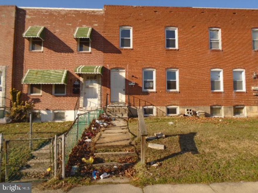 All Brick town home offers 3 levels of living space. Off street parking in rear ! This home has a bath on every level. Upper level has 3 bedrooms and full bath. Main level has kitchen, living room and bath. Lower level is finished with 1/2 bath and bonus rooms.  Fenced rear yard backs to alley . Close to schools , shopping and park. Easy access to tunnels and key bridge. Agents view documents on this listing and agent remarks for contract details . OPENS TO INVESTORS 2.26