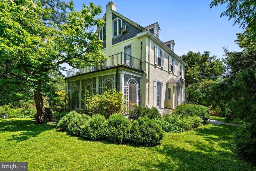 Where elegance endures and opportunity awaits, 4105 Leland Street is a gracious and timeless Colonial Revival in the heart of the Town of Chevy Chase.  Sited on a stunning 21,656 SF lot with mature trees and garden-lined paths, 4105 Leland Street is a rare opportunity for home design enthusiasts, with six bedrooms, four and a half bathrooms, and architectural refinement at every turn. This is the kind of home that rewards vision and promises lasting value.

This elegant family home has hosted countless garden parties, holiday dinners, and quiet evenings by the fire. Its stucco and lattice-wrapped façade, covered entry, and thoughtful symmetry hint at the home’s pedigree. Inside, rich hardwood floors, intricate moldings, wood-paneled ceilings, and handsome millwork speak to traditional craftsmanship rarely replicated today. Though the home calls for a full renovation, the bones are there, scale, flow, light, and presence, waiting for a new owner to restore, reimagine, and revel in the results.
From the gracious foyer, the formal living room with fireplace opens to a cozy screened porch, wrapped in vintage lattice paneling. Sliding glass doors lead to a wide flagstone patio and a truly expansive backyard, a rare, private haven just minutes from downtown Bethesda. Sheltered by flowering shrubs and mature trees, the yard could easily accommodate a pool, sport court, or show-stopping garden.

The main level offers elegant entertaining spaces, a cheerful kitchen footprint, powder room, and multiple outdoor access points. Upstairs are four bedrooms and two full baths, with two more bedrooms and an additional bath on the top floor. The lower level includes a recreation room, full bath, exterior entry, laundry, and generous storage, all flexible for future redesign.

4105 Leland is more than a property; it’s a rare chance to create something extraordinary in one of Chevy Chase’s most beloved neighborhoods. Walkable to restaurants, Metro, and shops, yet tucked into a quiet corner of tree-lined charm, this home offers suburban tranquility with city-side access and spectacular privacy in a garden rich with possibility.

The Town of Chevy Chase is a vibrant residential enclave known for its architectural character, well-maintained streets, and unmatched convenience. Just north of the D.C. line, this historic community offers instant access to downtown Bethesda, Friendship Heights, and Connecticut Avenue, with local cafés, boutiques, and beloved institutions just moments away. With a strong municipal government and thoughtful zoning, the Town preserves the charm and livability that make it so desirable. Parks, trails, and favorites like Olympia Café and La Ferme are all nearby. Zoned to Chevy Chase Elementary, Silver Creek Middle, and B-CC High School.