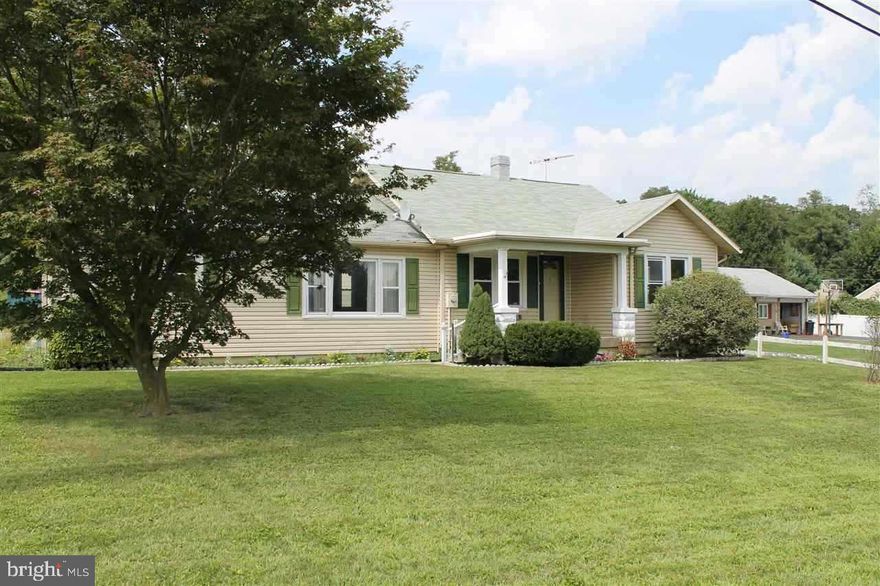 This adorable rancher offers tons of possibilities! Just miles from the MD line.  3 bedrooms and 2 full baths. Gorgeous lot. Huge family room and Master bedroom were added in 2001.  What a deal, this one is a must SEE!  One car garage and 2 story outbuilding in large backyard  Tons of parking