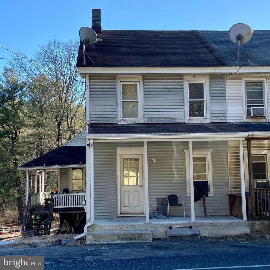 Good investment opportunity or first-time home. Property could use a little TLC, but has good bones. Sale includes parcels 24-10-0188.000 & 24-10-0182.004 for a total of 0.41 acres. Parcel without house is in a flood zone, parcel with the house is NOT in a flood zone and does not require flood insurance. Large basement and attic space for lots of storage. Brand new oil tank installed this year. Good backyard view with a stream.