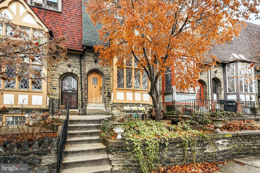 This charming 3 bed, 1.5 bath English Tudor row home is located in the highly desirable Stonehurst section of Upper Darby Township. With its rich woodworking details, original beams, inglenook with fireplace, and overall cozy vibe, this home exudes incredible charm.
The eat-in kitchen has been beautifully renovated to include stainless steel appliances, granite countertops, and access to the back of the home with parking. The home is situated within walking distance to schools, public transportation, shops, and dining options, making it an ideal location for daily living and convenience.  This home is so very special!  Book your showing today.