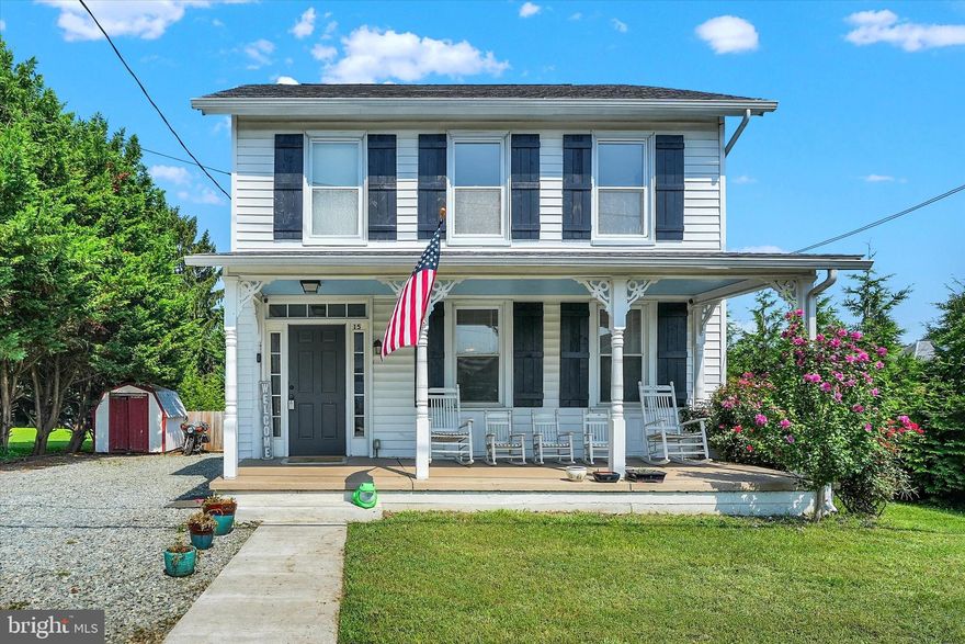 Affordable opportunity! Located in the charming town of Rising Sun, Maryland, 3-4 bedroom, 2 full bath colonial, built in 1900 and situated in the Rising Sun School District with close proximity to I-95 and the Pennsylvania and Delaware State lines. As you enter you will be greeted with a sprawling foyer, providing ample room for a mudroom area or drop zone. Adjacent to the foyer are the living and dining rooms, featuring beautiful original hardwood flooring. Kitchen details include attractive LVP flooring, stainless steel appliances, recessed lighting and a spacious peninsula with a granite countertop and seating. Additional main level details include a full bath and main level bedroom with private deck access. Upper-level features include laundry, full bath, 2 roomy bedrooms, as well as a bonus room which could be utilized as a fourth bedroom or home office space (no closet). The recently finished 23' X 12' attic is accessed by a door on the second level with highlights that include striking wood walls and ceiling, new neutral carpeting, recessed lighting, mini-split, large sectional sofa and an original brick accent wall. Ideal for a play area, art studio or family room! Upgrades include an architectural shingled roof (2020), 2 decks (2025), 2 HVAC units (2020), as well as numerous interior upgrades. Exterior features include a fenced-in rear yard, 12' X 20' finished shed with LVP floors, insulation, drywall and electric as well as a sizable covered front porch. Located just steps from the walkable, friendly downtown area and parade route! If you are searching for a recently updated, affordable and historical place to call home, your search is over...15 N. Walnut Street...Welcome Home!!! **Please Note--Square Footage Reflects Finished Third Floor**