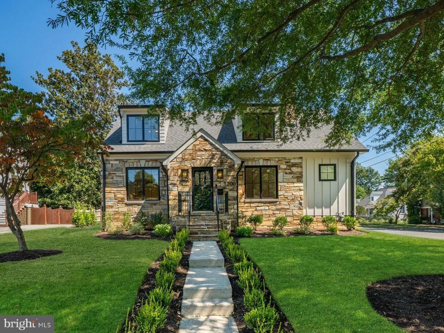 Unique opportunity to own a storybook stone residence, completely reimagined and expanded by the esteemed Falls Church City builder Randhawa Construction. This 4 bed/4 bath home seamlessly blends the enduring charm of its near-century-old stone exterior with the sophistication and convenience of new construction. The result is a home that reads as a top-to-bottom rebuild where no expense was spared, offering the craftsmanship, design, and finishes found in today’s most sought-after luxury homes.

The main level’s open-concept floor plan is ideal for modern living. Hand-laid oak hardwood floors, custom built-ins, and architectural details showcase the thoughtful craftsmanship throughout, while original features such as the stone fireplace and preserved vintage brass mortise door hardware add authentic period character. Newly enlarged, high-performance windows bathe the interiors in sunlight and capture picturesque views in every season.

The chef’s kitchen is a true showpiece, featuring slim-frame custom cabinetry, a quartz waterfall island designed to accommodate bar seating, and a full suite of Wolf/Sub-Zero appliances.  Perfect for entertaining, the kitchen flows directly into the expansive family room with its own wet bar, adjacent full bath, and convenient laundry.

Upstairs, the primary suite serves as a private retreat with a custom walk-in closet and a spa-inspired bath boasting heated floors, an oversized glass-enclosed shower with premium fixtures, and a private water closet. Secondary bedrooms feature cathedral ceilings, integrated dressers nestled under the eaves, custom closets, and oversized dormer windows overlooking a majestic willow oak.

The lower level offers flexible living with a guest/in-law suite or recreation room, complete with full bath, second laundry, storage, and a spacious mudroom with custom-built cubbies adjacent to the two-car garage.

Outdoor living is equally impressive, with an expansive screened patio overlooking the professionally landscaped yard—perfect for dining, lounging, entertaining or outdoor play.

Located in the heart of Falls Church City, this home offers unmatched convenience: walk or bike to the West Falls Church Metro (0.6 miles), shops, restaurants and movie theater (0.3 miles), the W&OD Trail (0.2 miles), High Point pool (0.3 miles), and the weekly farmers market, community center, and library (0.7 miles). Beloved for its small-town feel, sought-after Falls Church City is a close-knit community celebrated for its neighborhood events, fantastic local dining, and top-rated schools.  

Main image is architectural rendering (some details may vary).  Please see documents for architect’s renovation elevations, site plan, floor plan and builder home specs.  (Note: Adjacent lots 23 & 24 are owned by the seller and also available for purchase, offering potential for expansion—whether a detached structure, ADU, or pool.) Seller is a licensed real estate agent in VA.