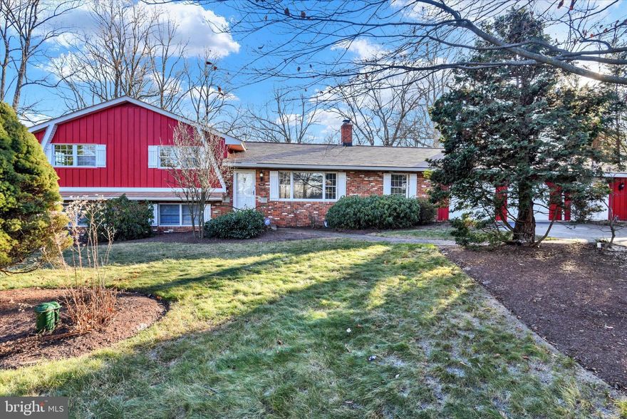 Let's talk about this home!  From the moment you pull in you are enveloped with the space this property has to offer!  With an oversized repaved driveway and a 3 car garage, with propane heater, there is room for all your vehicles and outdoor toys.  Walk in the front door and the beautiful, newly refinished  hardwood floors gleam.  The living room offers plenty of space for gatherings, a wood burning fireplace, built ins and views of your tranquil back deck from the sliding glass doors.  Off the living room you have access to a formal dining room  and the expansive kitchen.  The kitchen was remodeled in 2009 and has plenty of space for a table, a huge working  island,  updated appliances, solid surface countertops and another door to the partially covered 2 tier deck.  Off the kitchen you will find access to your 3 car garage, a full bathroom and the laundry area, equipped with a state of the art dryer that has its own dry cleaning feature!  Travel upstairs and you are greeted with the primary bedroom with ensuite, 2 additional generously sized bedrooms and hall bath.  Head down to the lower level and get ready to cozy up by the fire - that is right -  it has a 2nd fireplace fueled by propane and plenty of room for a fun movie night.   This area also offers another full bath, access to the back yard and fresh carpet.  But wait there is soooo much more!  The 2nd lower level offers a blank slate.  This huge area could be anything you can dream from storage, to a workshop or additional living space and it has access to the outside as well.  The possibilities are endless.  Take a trip outside and feel a calmness from the peaceful water feature and the tranquility of this large 1.24 acre lot that backs to trees.    The shed offers more storage options as well.  But remember I said there was soooo much more!  This home has a brand new synthetic cedar shingle roof (2023), freshly painted exterior (2023), 2 newer water heaters (2020), new water filtration system  (2023) with reverse osmosis on the 2 kitchen sinks and a new split rail fence (2023)!  Come see this home, you will fall in LOVE!