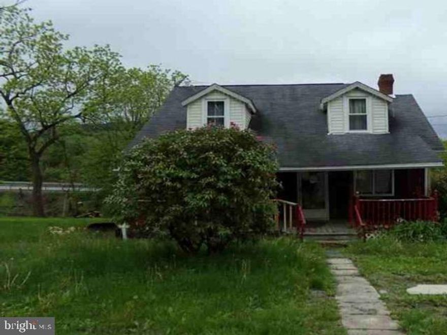 Built in 1945, this cape cod style home offers approximately 1292 finished square feet, four bedrooms, one full and one half bath, unfinished basement, covered front and rear porch and detached one car garage. This home sits on an approximate 108,900 sqft lot (2.5 acres).