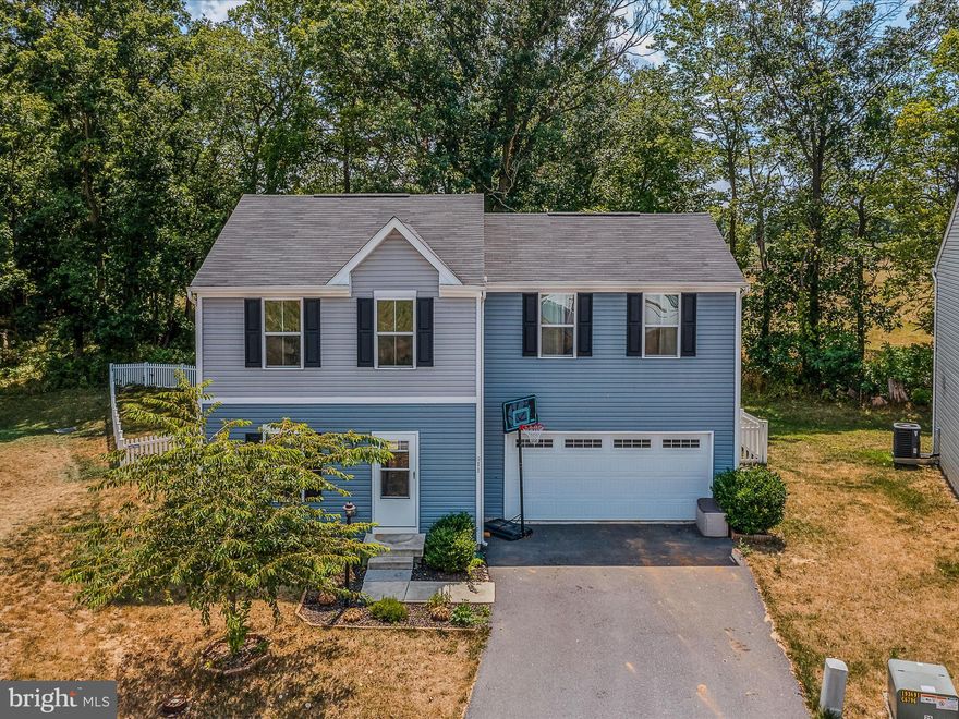 This move in ready colonial is not only in the much sought after neighborhood of Stonecrest, but it is also on a cul-de-sac. That's the dream! The large driveway and 2 car garage afford lots of off-street parking for your family or guests. Inside you have a spacious living room with bright windows and LVP floors. The living room is open to the kitchen and dining room. This is a great set up for entertaining, especially with the holidays coming up! Your large kitchen features recessed lighting, raised panel cabinetry, and stainless-steel appliances. The large island provides extra storage and prep space. Easy-care vinyl floors carry through the kitchen and dining room. The dining room features rear yard and powder room access. Upstairs you have 2 generously sized bedrooms with bright windows, carpet, and ample closet space. The hall bath includes a single bowl vanity and acrylic tub/shower. The primary suite features carpet and ceiling fan light fixture. You have a huge walk-in closet and a private ensuite with single bowl vanity and acrylic tub/shower. The second floor is completed by a convenient laundry room. No lugging laundry up and down the stairs! The lower level is a full, unfinished basement. Presently, it offers great storage but could be finished for future expansion. Outside you have a spacious rear yard. The yard is fully fenced and backs to mature trees for privacy. It's ready for your furry friends! This home has everything you want and need! Call for your showing today!