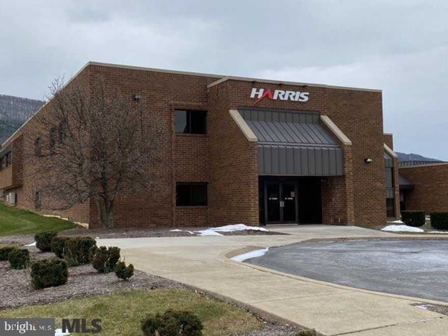 176 Technology Drive is a multi-tenant facility with a mixed use of office space and manufacturing.  Currently there are five suites ranging in size from approximately 5,000 feet to 17,000 feet.  Lease rates vary from $12 - $16/ft.  The facility has unlimited parking for your company's needs and is conveniently located to 322 allowing easy access to routes 99 and 80.  The facility has multiple loading docks, varied ceiling heights and has the ability to be further divided or combined depending on a company's needs.  The setting is picturesque with views of Mt. Nittany out the front and Tussey Mountain to the rear.  The building is the focal point of the Boalsburg Technology Park which has become an economic hub of Harris Township and Centre County, with many businesses locating along the contiguous Discovery Drive.  This property is perfect for your investor buyer or for the end user.  Endless possibilities.  Condo Association maintains the common elements for the Park.