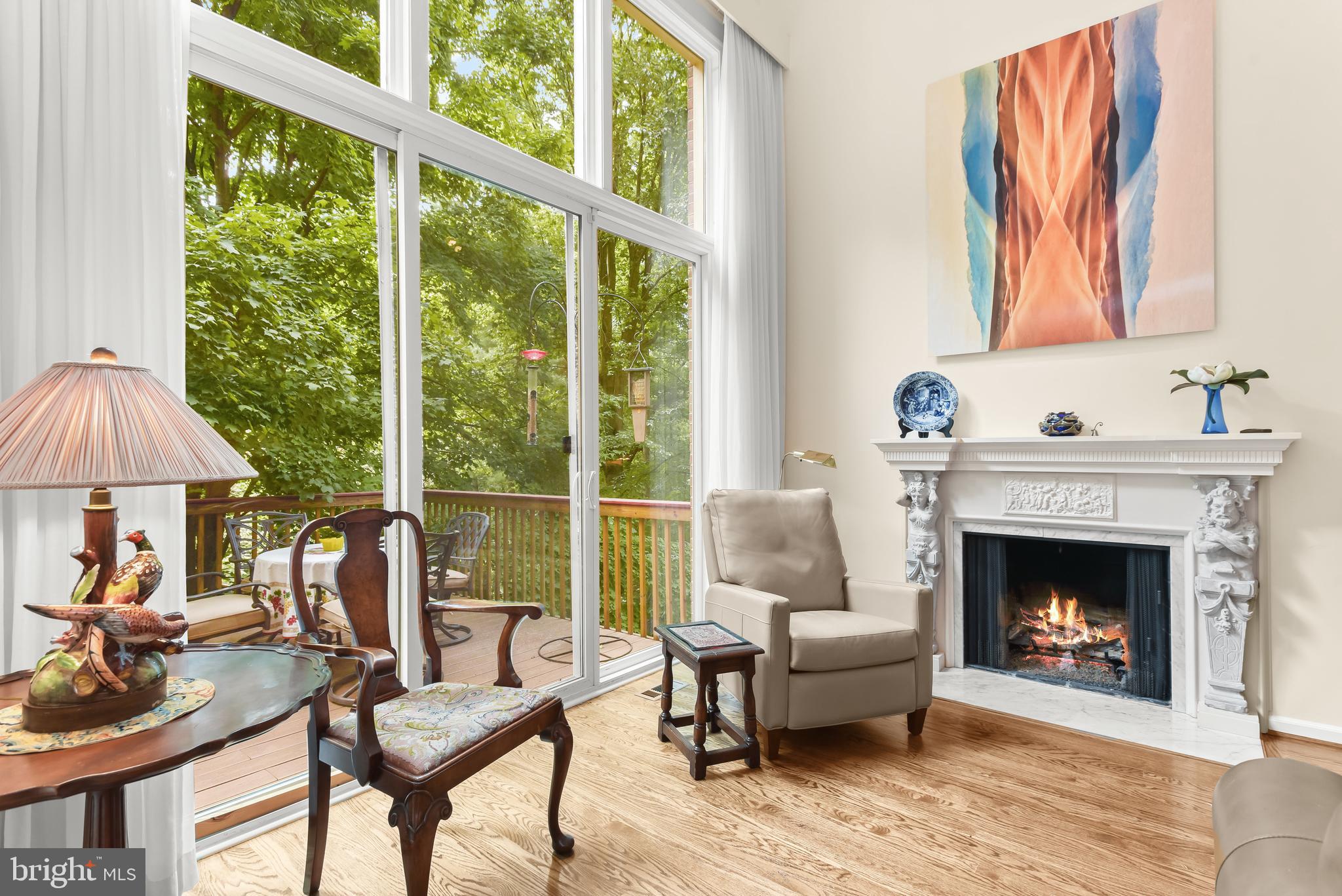 Terrific townhouse in super convenient location, on quiet block just off Goldsboro Road with easy access to DC and downtown Bethesda. Large sunny rooms with high ceilings and huge windows, elevator serving three levels, two car garage opening directly into the house. On the main floor are bright, spacious living and dining rooms opening to a charming deck, an eat-in kitchen, and a comfortable den or office with its own outdoor space. Upstairs are two generous master bedroom suites (one with universal design shower) and an open office area; the expansive lower level has a large family room with high ceiling and walkout to private covered porch, bedroom, and full bath -- great for guests or visiting adult children. Large lower level storage room plus great closets throughout.