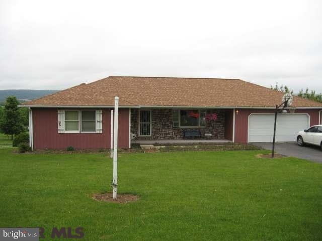 The views are spectacular! This charming ranch sits on a beautifully landscaped 1.37 acres. The horses come right up to your fence. 1st floor living with a completely finished lower level to use as you wish. Popular Colyer Lake area. Minutes to State College.