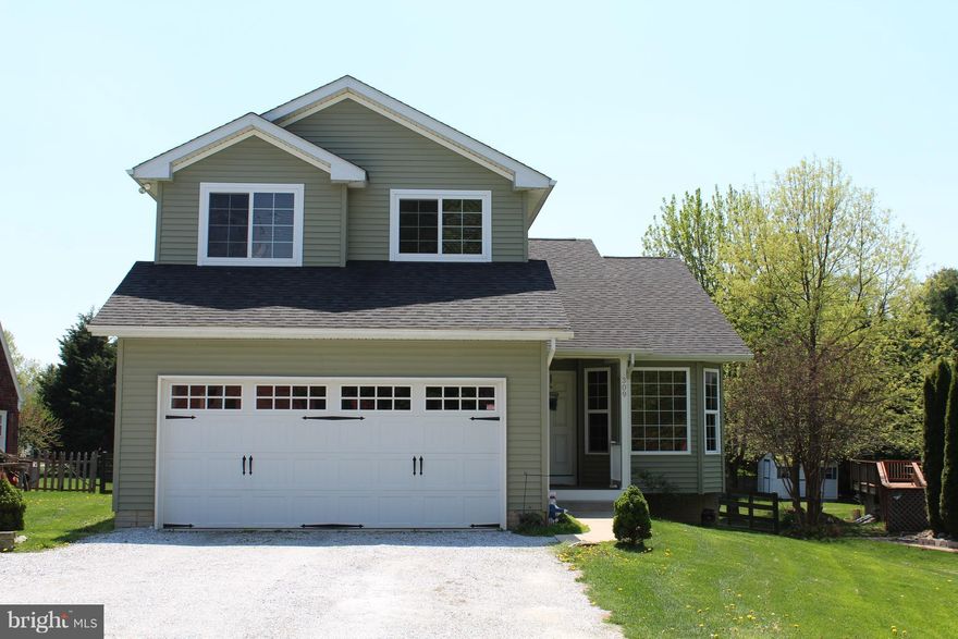 If your looking for a large master bedroom on the first floor with a full bathroom you should tour this Colonial home.  Has 3 Bedrooms, 2.5 Baths with two spacious bedrooms on the upstairs 2nd level. The lot is beautiful and has a level fenced rear yard.  Within easy walking distance to McDaniel College & shopping/restaurants. Beautiful hardwood floors-family room-hallway-all bedrooms. Oversized 1st floor laundry with washer & dryer included. Recessed lights in kitchen-family room. Bay window-breakfast nook. Cathedral ceilings-family room with slider to huge deck. Oversized areaway with slider exit from basement. Huge 2-car front entrance garage. W/D/R incl. This is a really nice single family home with an affordable and fair price.