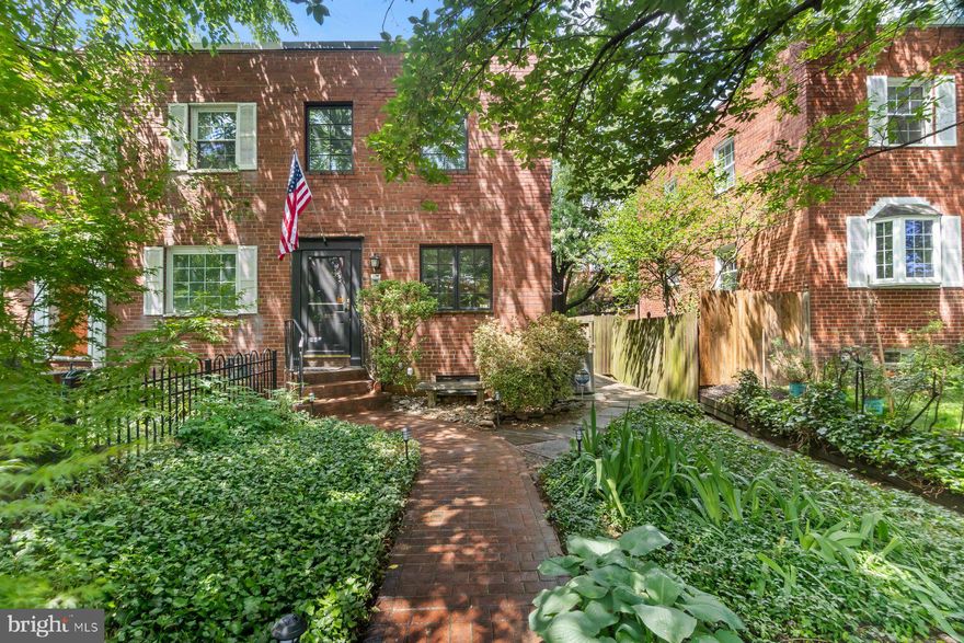 Charming Townhome in the Heart of Historic Old Town Alexandria! Welcome to 725 S Columbus Street — a rare and beautifully expanded townhome in the heart of Old Town’s sought-after southeast quadrant. Larger than the typical Patrick Henry townhome thanks to a thoughtfully designed 2010 addition with an extended basement. This 3-bedroom, 3-bath gem offers extra living space and modern upgrades within Alexandria’s historic district.

Property Features:
An expanded floor plan with sunny living and dining areas, rich hardwood floors, and crown molding. Updated kitchen with stainless steel appliances, granite countertops, ample cabinetry, and a breakfast bar. Equipped with hidden rooftop solar panels, significantly reducing monthly electricity costs while promoting sustainable living. Enjoy a larger-than-average fenced lot — rare for the neighborhood — offering a sizable front yard and beautifully landscaped private back patio. A yard space for creating potential coveted off-street parking. The Primary bedroom includes a walk-in closet space, a fully renovated en-suite bath, and an adjoining office.  The finished basement contains ample storage cabinets that can accommodate a media center. Private Guest Room with Privacy for guests with a bedroom, bathroom, and separate entrance to the lower level. Low Maintenance Exterior: with well-maintained brickwork and roof, and low-maintenance aluminum-clad windows. Modern two-zone HVAC: An Efficient two-zone heating and cooling system for maximum comfort, heating, and cooling.

Prime Location:
Quiet residential neighborhood, just blocks from historic King Street’s boutiques, award-winning restaurants, and the Potomac waterfront parks. Minutes to Washington, DC, National Landing (Amazon HQ2), The Pentagon, and Reagan National Airport. Easy access to King Street and Braddock Road Metro Stations, GW Parkway, and Route 1. This expanded and energy-efficient home offers the ultimate Old Town lifestyle — charming, walkable, and ready to welcome you home.