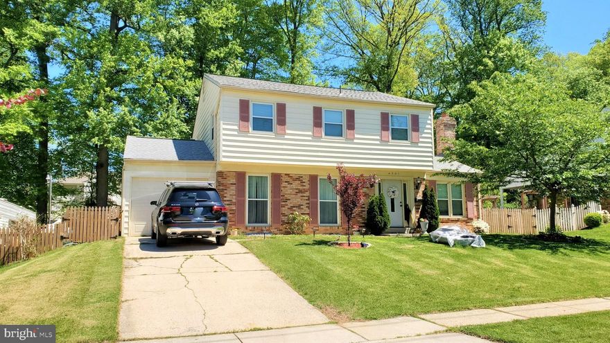 Don't be fooled by the facade...you're about to walk into a home that has experienced a premium renovation from top to bottom. This is a beautiful 4 Bedroom, 3.5 Bathroom Home!!

As you enter through the front door, you'll see your light and bright expansive living room to fit your friends and family. Follow the smell through the dining room into your gourmet kitchen. Featuring beautiful wood cabinets, granite counters and stainless steel appliances, you will be wowed. The living room is the exclamation point on your main level.....as there's a sliding glass door to your new LARGE stone patio.

Let's go upstairs to see your 4 full size bedrooms. The master suite features a beautiful bathroom that you'll have all to yourself. The occupants of the other bedrooms will share the other upstairs full bathroom. Notice the energy efficient windows too.

To get away from it all we can head down to the finished basement. The larger family room is ideal for a TV watching space and the separate study makes for the perfect office. The utility/laundry room (complete with new large capacity washer and dryer) is down here too. You don't even need to go back upstairs to use the restroom. You've got a full bathroom right there.

Topping it all off is the backyard with room to run around, fire up the grill or just relax and enjoy the fresh air. There's even a 1 car garage too!