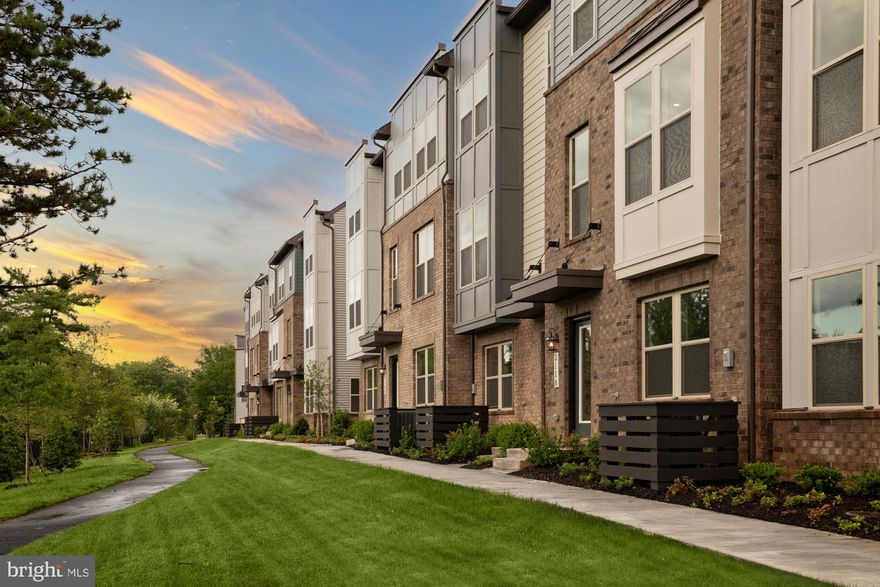 Discover Your Dream Home with the Jenkins 
The Jenkins at Park Place is our most sought-after floorplan, perfectly blending sophistication and functionality. This END UNIT 3-level townhome offers 3 bedrooms, 2 full bathrooms, and 2 half bathrooms, making it ideal for families, professionals, and those who love to entertain.

Spacious Living Designed for Modern Lifestyles 
Step into the main level’s open-concept layout, where tall windows bathe the space in natural light. The chef-inspired kitchen, featuring designer finishes, a large island, and ample storage, flows seamlessly into the dining and living areas. Whether hosting gatherings or enjoying a quiet evening at home, this layout is designed to enhance your lifestyle. A covered balcony extends your living space, providing the perfect spot for morning coffee or evening relaxation.

Versatile Lower Level for Endless Possibilities 
The ground level welcomes you with a versatile recreation room that can easily transform into a home office, gym, or den. The 2-car garage offers generous space for parking and additional storage, ensuring all your essentials are organized and within reach.

Luxury and Comfort on the Upper Level 
Escape to the private primary suite, featuring a spacious walk-in closet and an en suite bathroom designed for ultimate relaxation. Two additional bedrooms and a full bathroom down the hall provide ample space for family members or guests, ensuring everyone feels right at home.

Prime Location, Vibrant Community 
Living at Park Place means enjoying a vibrant community with unparalleled convenience. Walk to the Innovation Metro Station (Silver Line) and explore the upcoming Rivana Town Center just steps away. With quick access to major commuting routes and only 2 miles from Dulles International Airport, this location is perfect for those on the go.

Don’t miss your chance to own the Jenkins—our most popular floorplan. Discover the perfect blend of style, comfort, and community today!

*Photos are of a similar model home