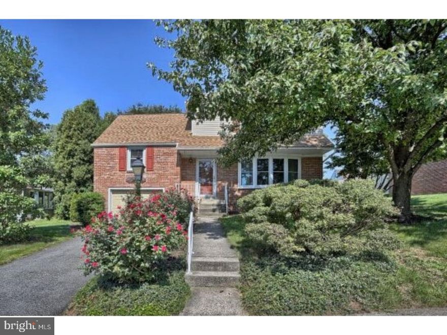 Imagine coming home to this beautifully maintained multi level home with ample space for your growing family. Upon entering, you'll fall in love with the stunning red oak floors. The quality updated kitchen boasts quartz countertops, under mount sink, double ovens, tile backsplash and tile floors. Enjoy a quick bite to eat at the breakfast counter or in the adjoining dining room. This bright and cheery open floor plan leads to the newer 2 story addition featuring a spacious family room with bow window and sliders to the lovely rear pavered patios overlooking the level back yard and gardens. Your family will love the  abundance of living and storage space throughout the home. The second level  features 2 spacious bedrooms with closets and full hall bath. Stepping up to the next level, you'll be impressed with the new addition that boasts a spacious master bedroom suite with full bath, large closet, sitting area and cozy window seat. The original master bedroom on this level is also spacious and features a large closet.  An additional full bath with double sinks and large hallway closet complete this level. Sure to be a favorite is the unique loft with skylight on the upper level that can be a special creative living space. And that's not all...this home goes on and on! The lower level features a one car garage, storage and laundry areas. Stepping down you'll discover a bonus recreation room that lends itself to a variety of possibilities. This gem of a home has an ample 2,900sq ft total living space. Located in the desirable Crestwood neighborhood in the Exeter School District, you are close to major routes, shopping and many conveniences. Don't wait! Schedule your personal tour today before it's too late!