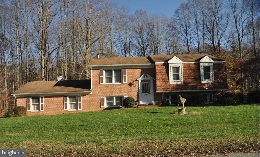 Spacious home on quiet cul de sac in No. St. Marys County. Convenient to Pax Rvr NAS, Waldorf & commute to DC.  Large country kitchen, good sized rooms throughout, finished bmnt w/masonry Fireplace w/wood stove insert. A little over an acre of land w/fenced back yard that backs to trees. Spacious 2 car garage. Seller giving $10,000 flooring allowance - a little updating will make this place shine!